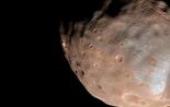 How an unknown satellite of Mars formed the current Phobos and Deimos Phobos is empty, like a tin can